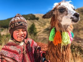 Peruvian Boy with Lama - SC Travel Adventures